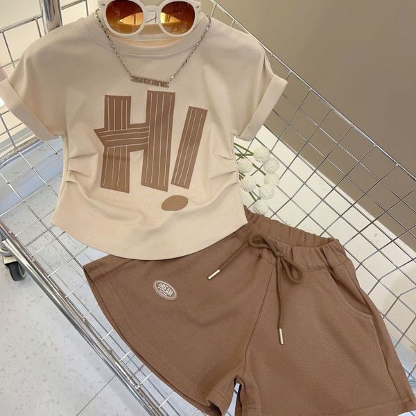 Костюм для дівчинки HI футболка з шортами Коричневий 150см 34567 фото
